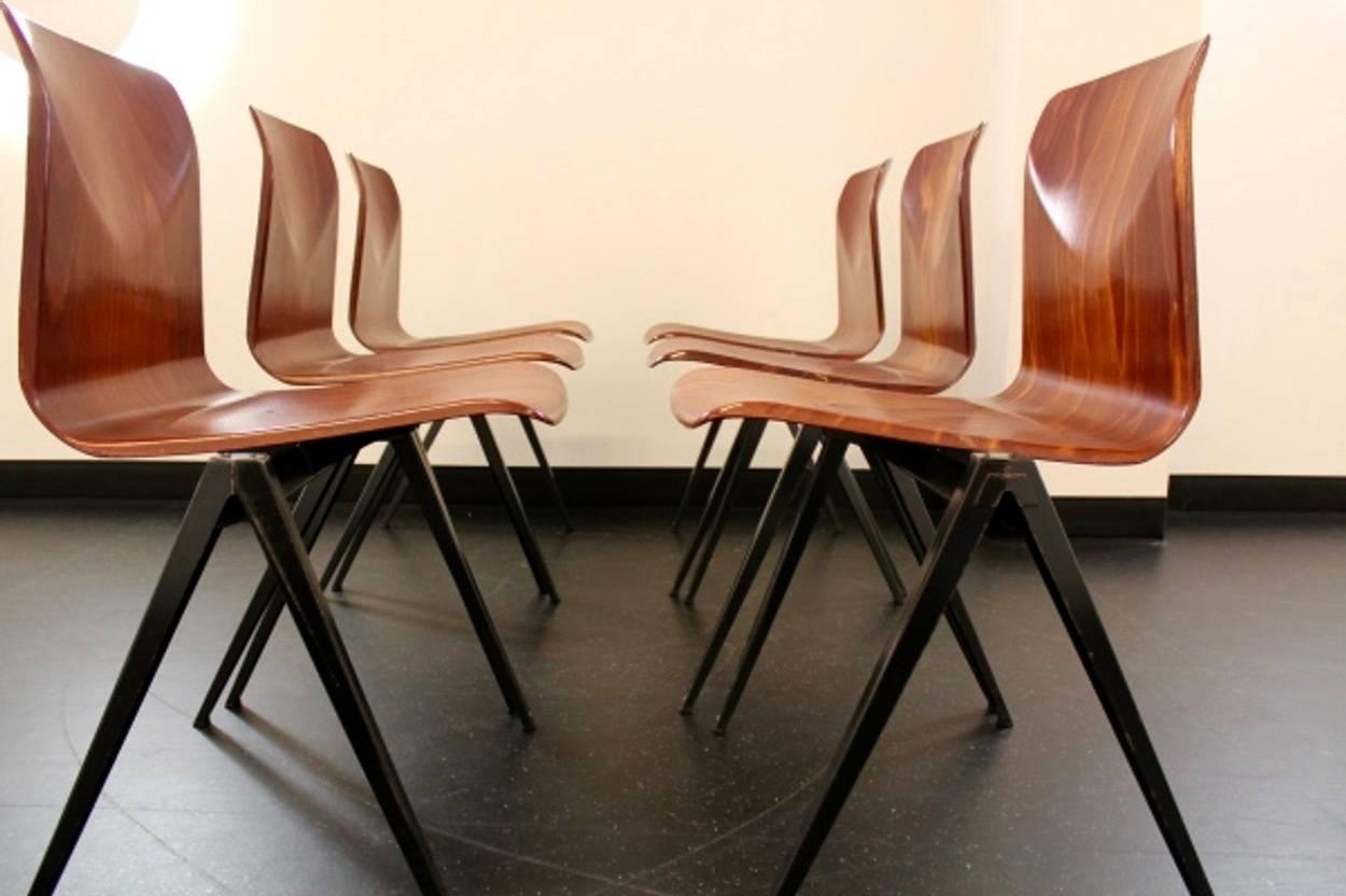 Highly wanted industrial stacking chairs by Pagholz Galvanitas, designed in the manner of famous industrial designs by Wim Rietveld, Jean Prouvé and Friso Kramer (‘pyramid’ or ‘compass’ base principal). These Sculptural chairs are made for optimal