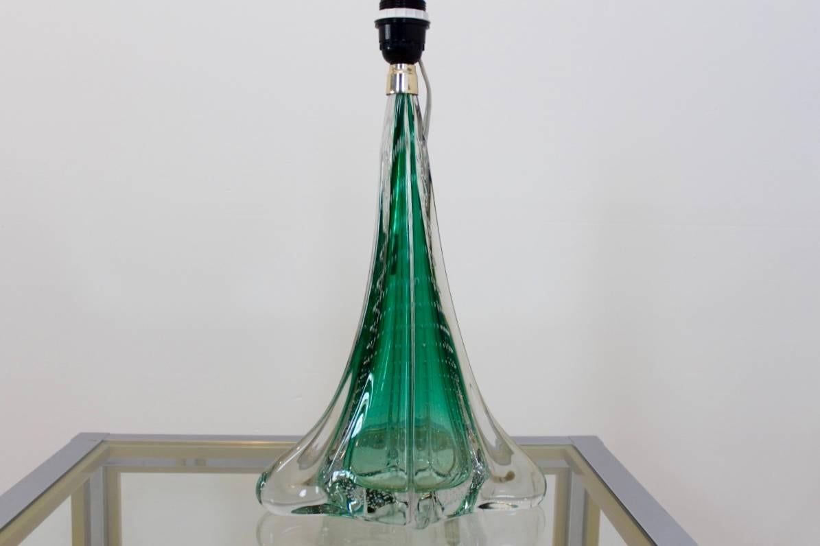 A unique translucent bubbled table lamp made by the old Belgium firm of Boussu in the 1960s. The history of glass production in Boussu is old and with great history. The factory has been closed for years now. This large scale handblown glass lamp