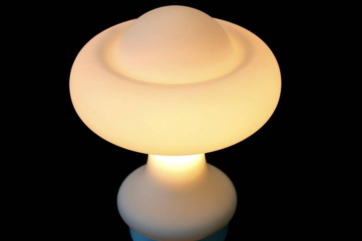 Iconic mushroom table lamp manufactured by Peill & Putzler. Comes in beautiful white handblown frosted opal glass. Lamp is labelled. Made in Germany. In Excellent condition.
 