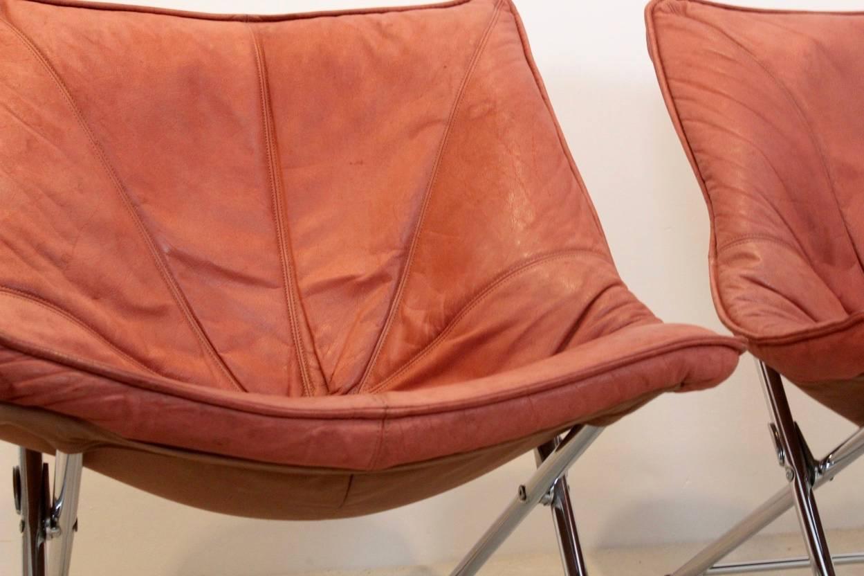 Fantastic set of Mid-Century easy chairs produced by Molinari and designed by Tein va Zanten in the 1970s. The chairs feature a stabile tubular chromed frame with very comfortable leather upholstery with organic shape. The chairs are easy going as