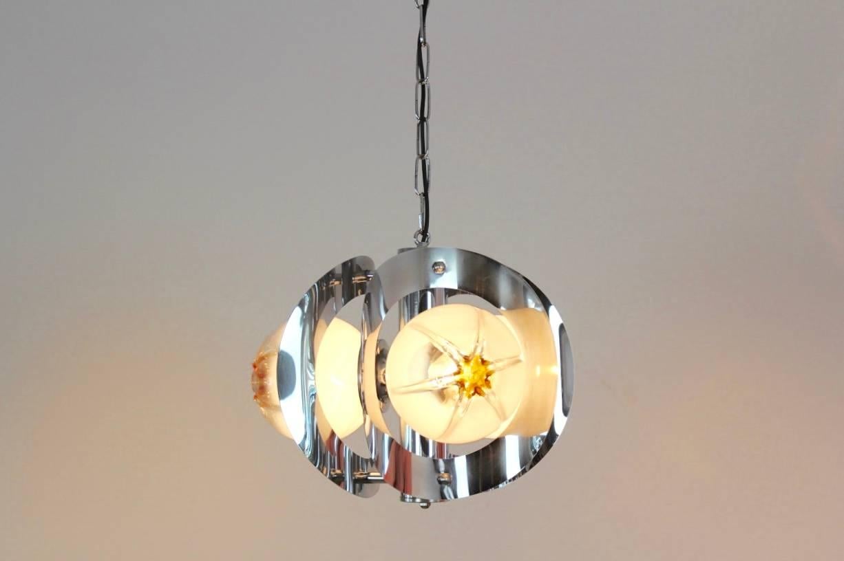 Wonderful chandelier made by A.V. Mazzega with three beautiful characteristic Murano frosted glass bowls on a stunning chrome base with three lights. Manufactured in the early 1970s. Very impressive glass chandelier and beautiful light effect when