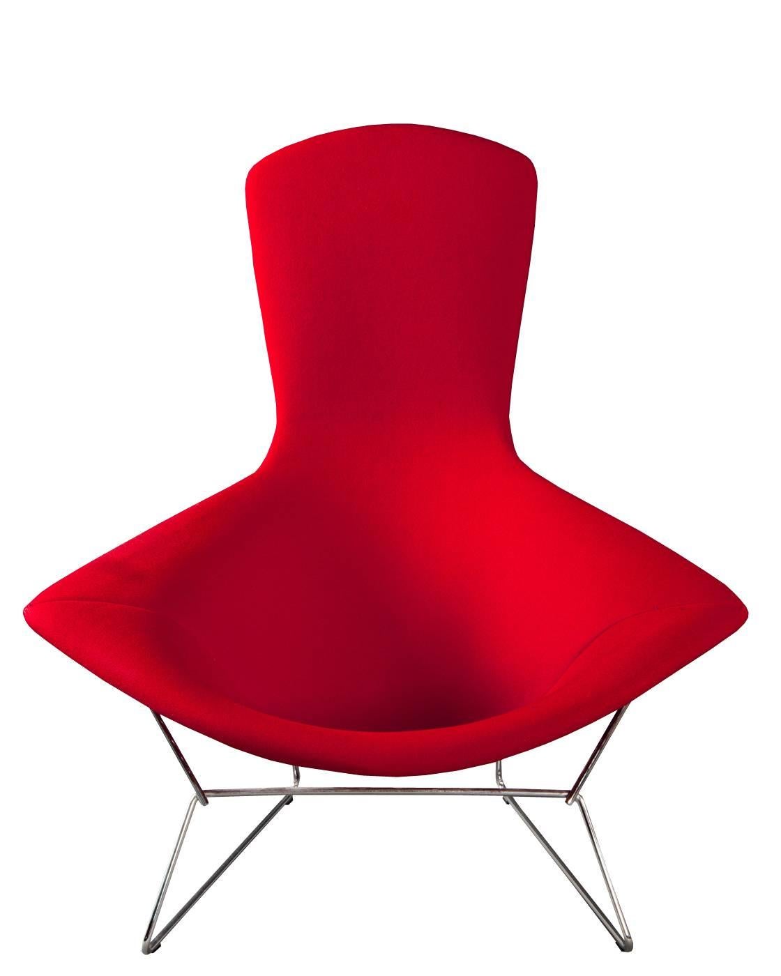 Lounge chair model bird chair designed in 1952 by Harry Bertoia for Knoll International.

The chair has a chromed steel wire design and upholstered in original classic bouclé Cayenne color fabric. The seat rocks on rubber