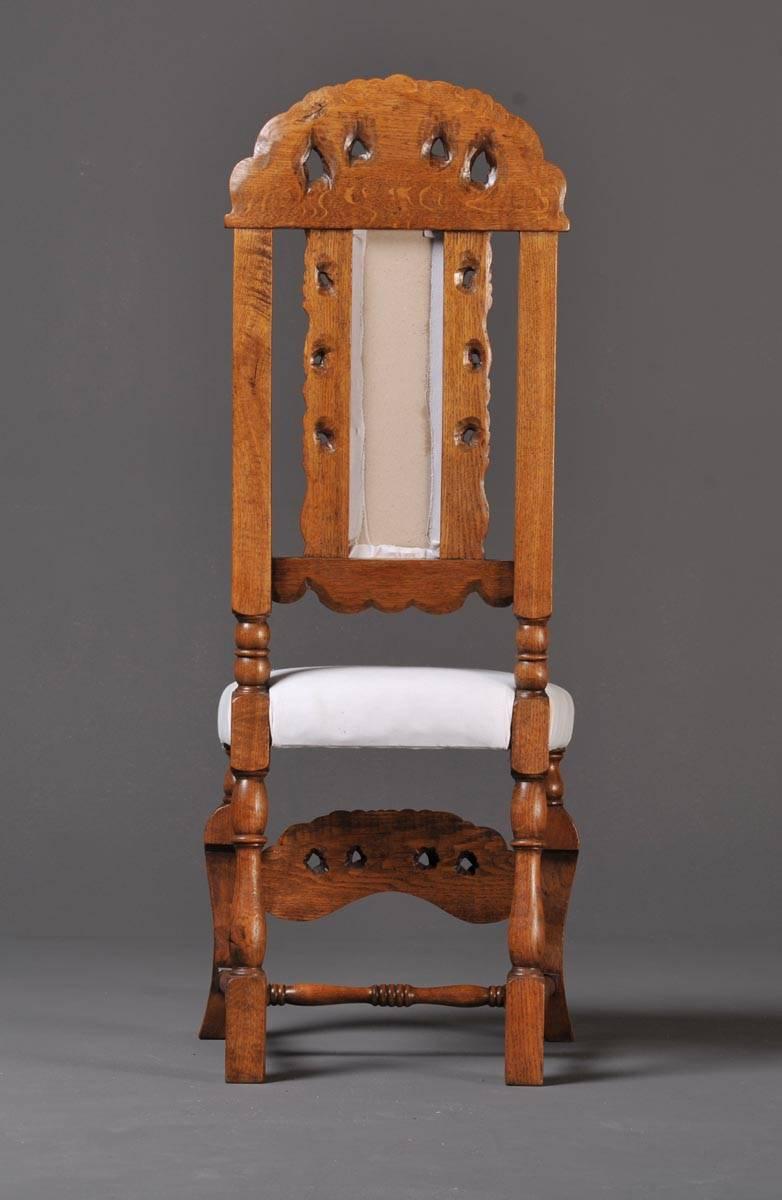 Impressive set of four dining chairs made at the end of the 19th century in neo-Baroque style. Completely new upholstered in white. Elaborate wood carving at the high backrest and legs.
Material: solid oak, upholstery
Measurements: W 88.5 x D 44 x