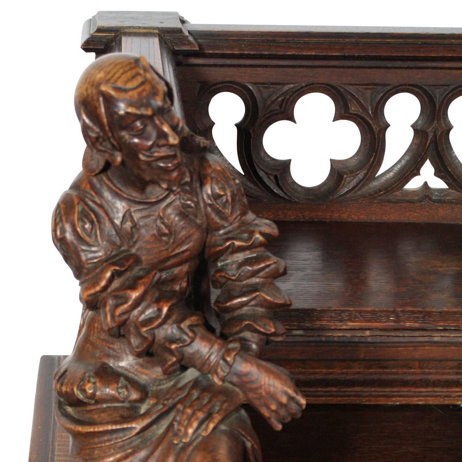This carved wooden Gothic desk and chair was Commissioned by Baron Alfred Moritz Friedrich Baumgarten Ph.D and built by Belgian sculptor Alphonse de Tombay in 1891 in Montreal, Quebec, Canada. While de Tombay is known mostly for his sculpture in
