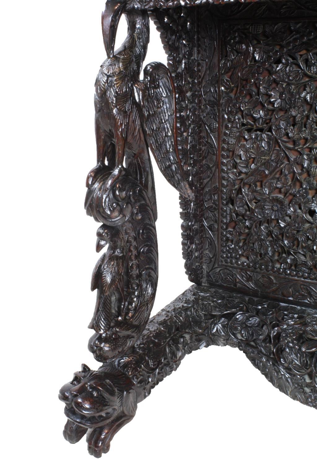 All-over carving on this exceptional piece. When we see these pieces the first place we look is the feet. The feet, especially the lions head detail, range in execution from fair to excellent, or have been extensively worn or damaged. This Davenport