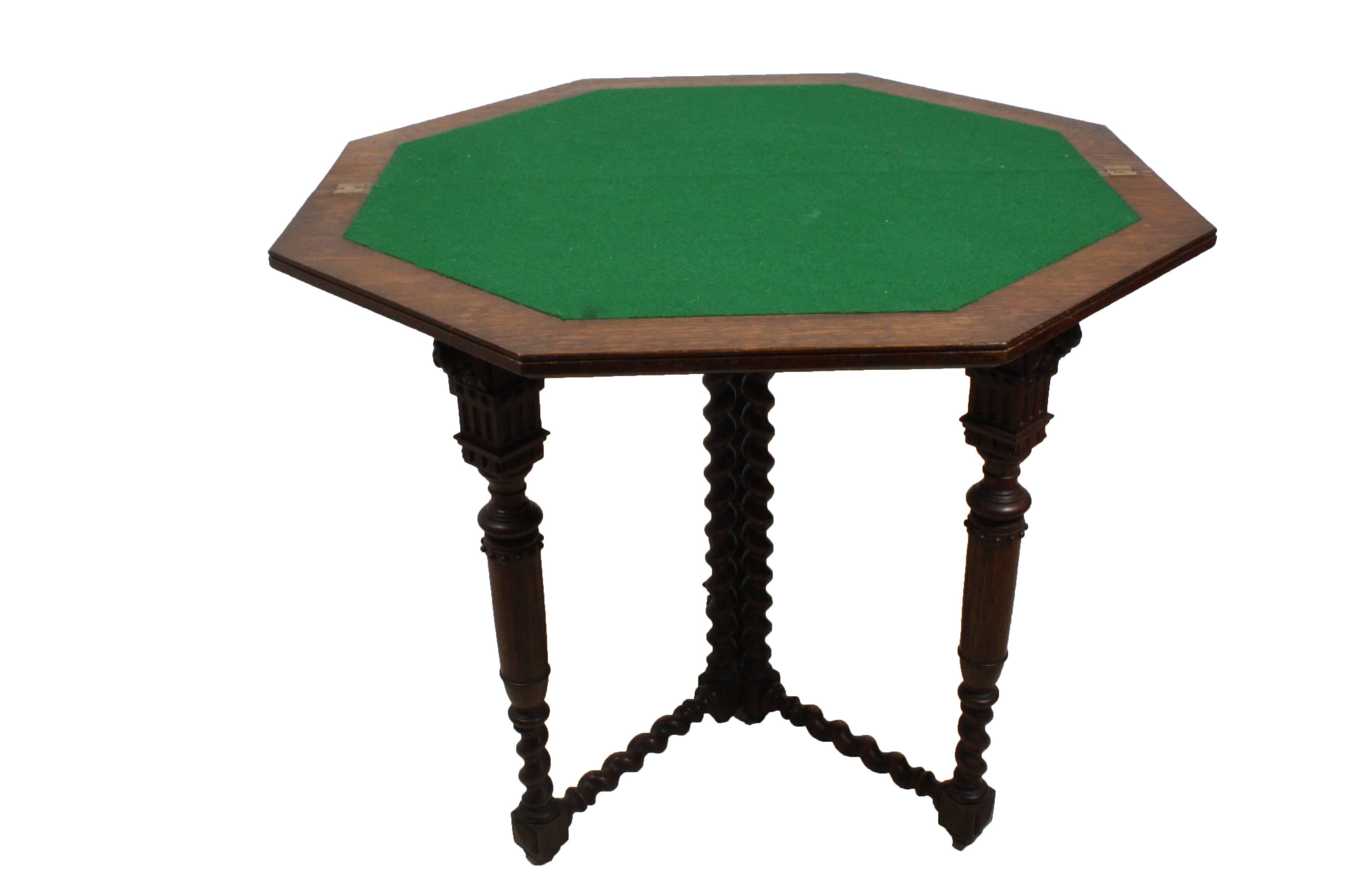 A convertible side table, or hallway table, that opens into a felt covered gaming surface. Barley twist stretchers and support spindles make for an eye-catching backdrop to the nicely carved lions heads and turned legs. 

Measured: 32" wide