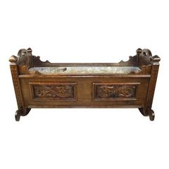 Swiss Carved Walnut Planter or Cradle with Stand, circa 1910