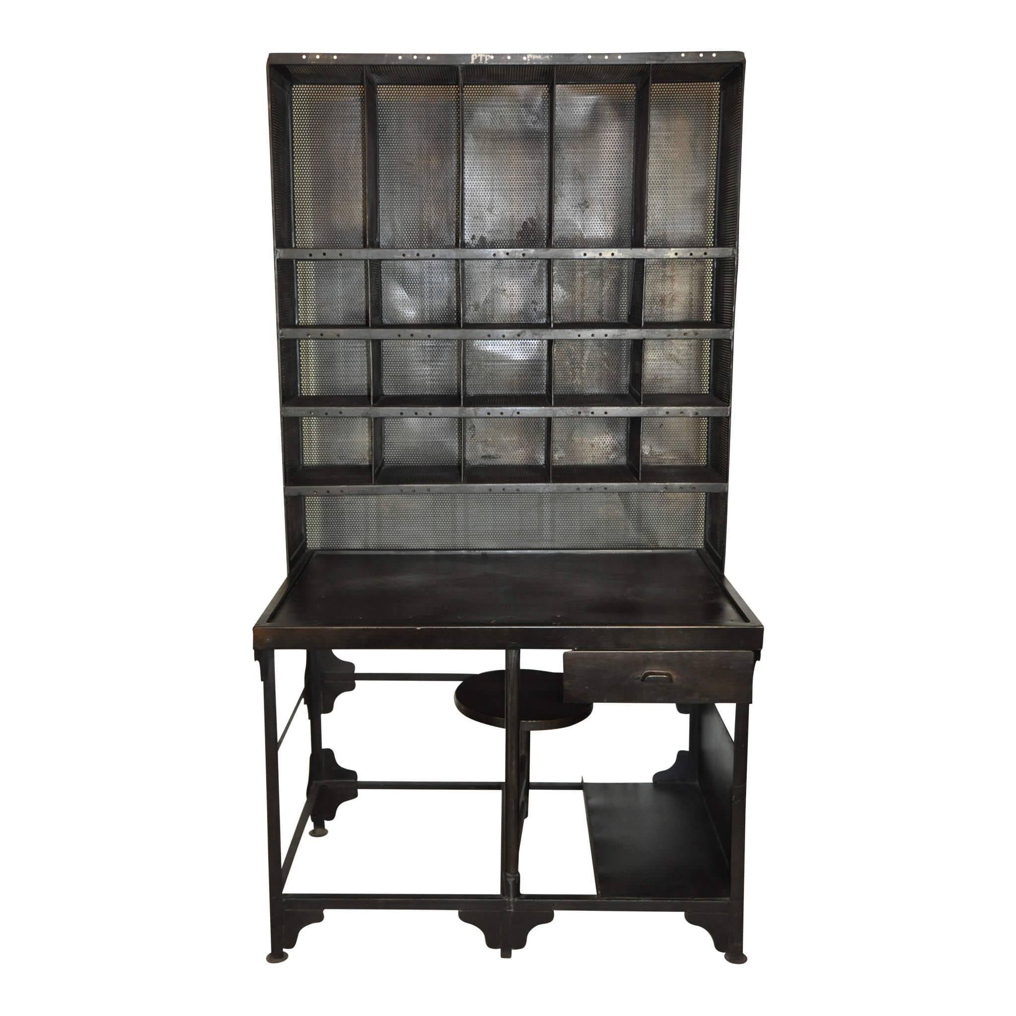 This steel postal desk features a 13 inch swivel seat, bracket leg bindings and 20 cubbies for storage. The height of the spacious desk top is 31 inches. Seat height is 19 inches.