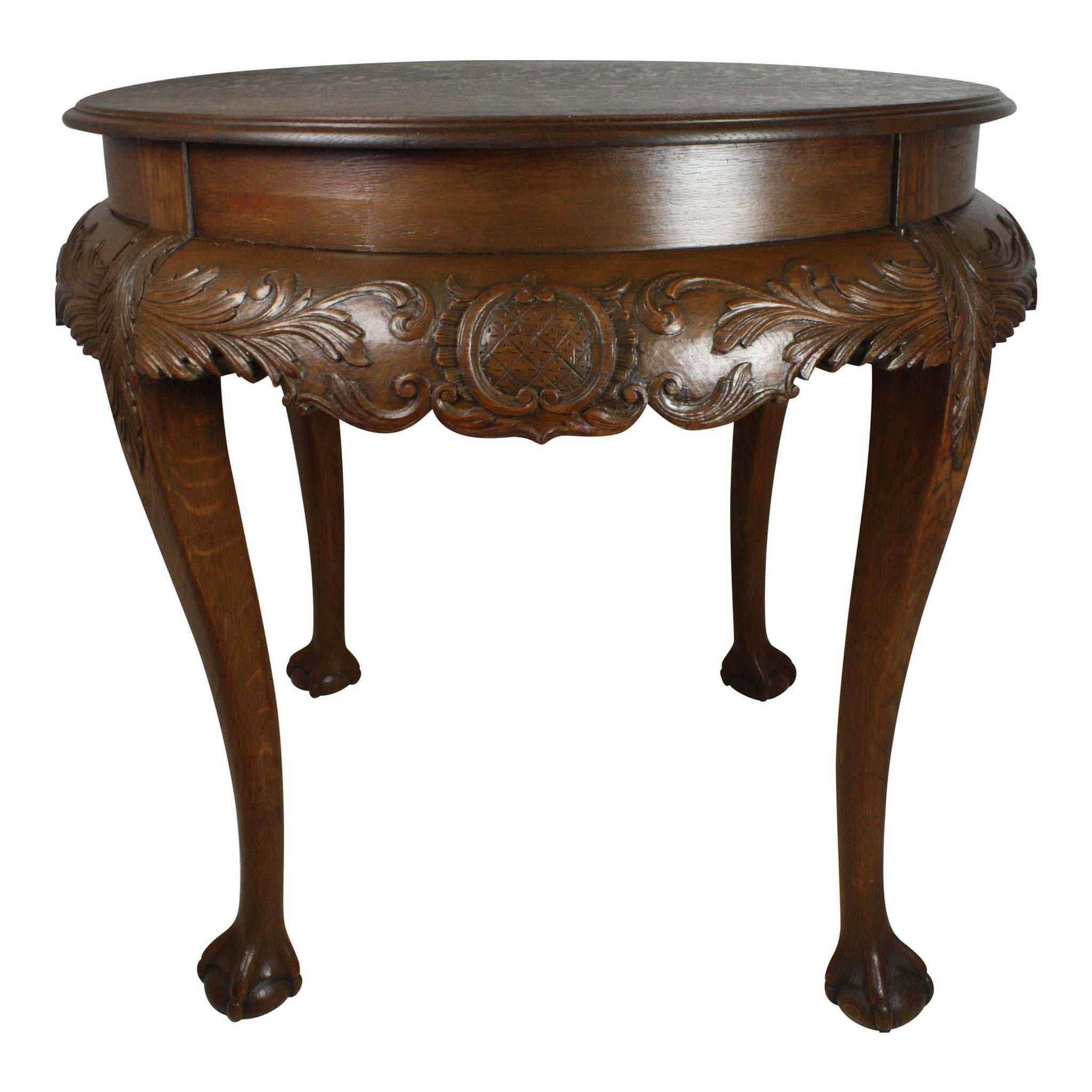 The skirt and legs are beautifully done in their own right, but where this piece stands out is the quarter sawn oak used for the tabletop. The consistency of the flecking is exceptional. Queen Anne legs are carved with acanthus leaves and ball and