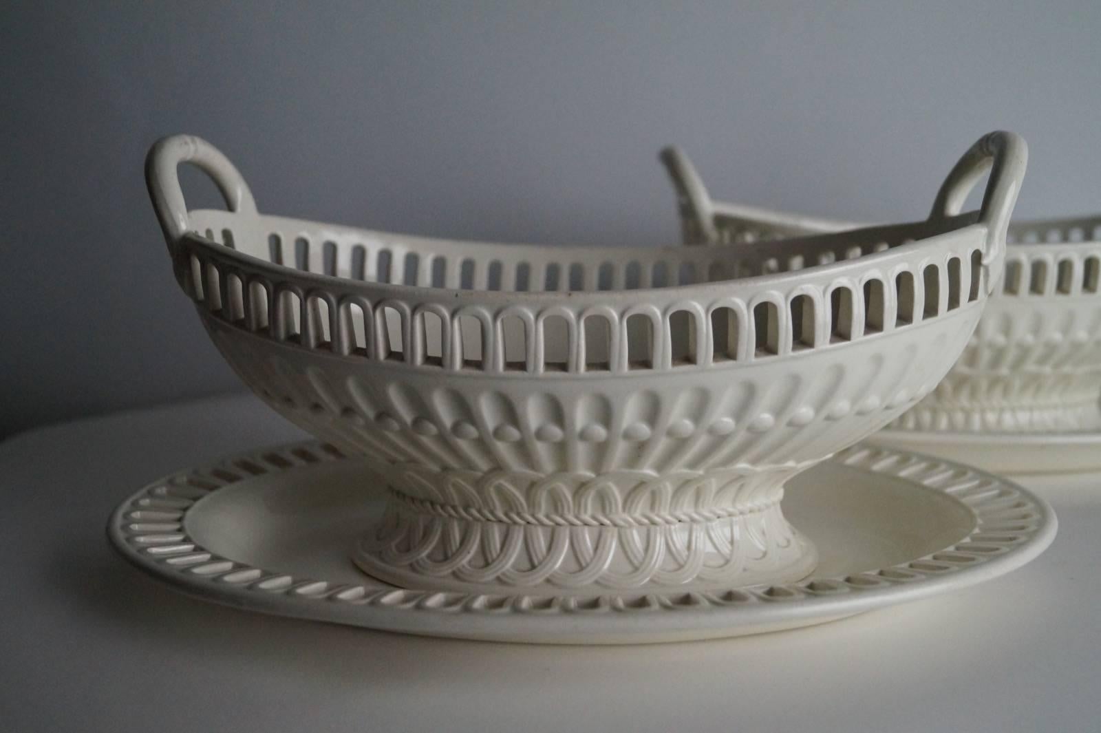 Two antique Wedgwood creamware open work baskets with under plates,
circa 1850 and in good condition.
Measures:
Four items (two baskets, two under plates):
Basket: 16.5 cm x 26.5 cm.
Under plate: 22.5 cm x 30.5 cm.