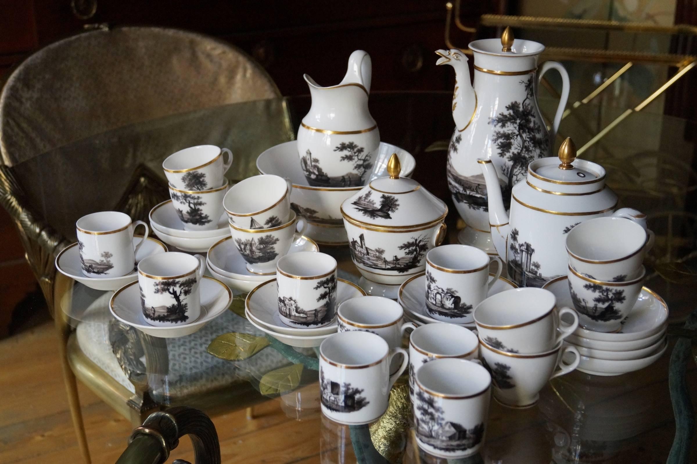 A fabulous hand-painted in black / sepia 'Old Paris' porcelain coffee and tea service. Every piece has its own unique hand-painted decor.

Coffeepot 28.5 cm high.
Teapot 19.5 cm high.
Two sugar bowl and cover 16.5 cm high.
Hotwater jug 17.5 cm