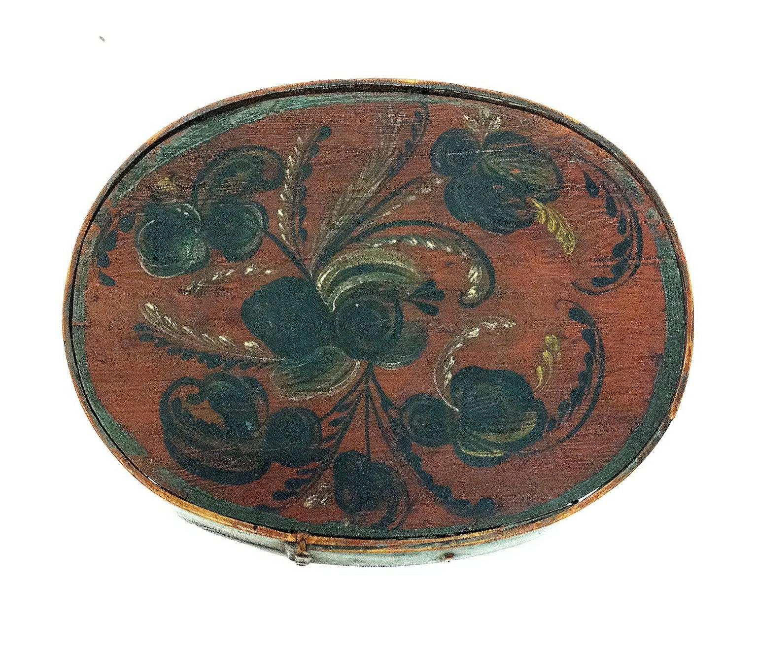 A small rose painted box, dated 1851, marked HKD 1851. From Telemark, Norway.