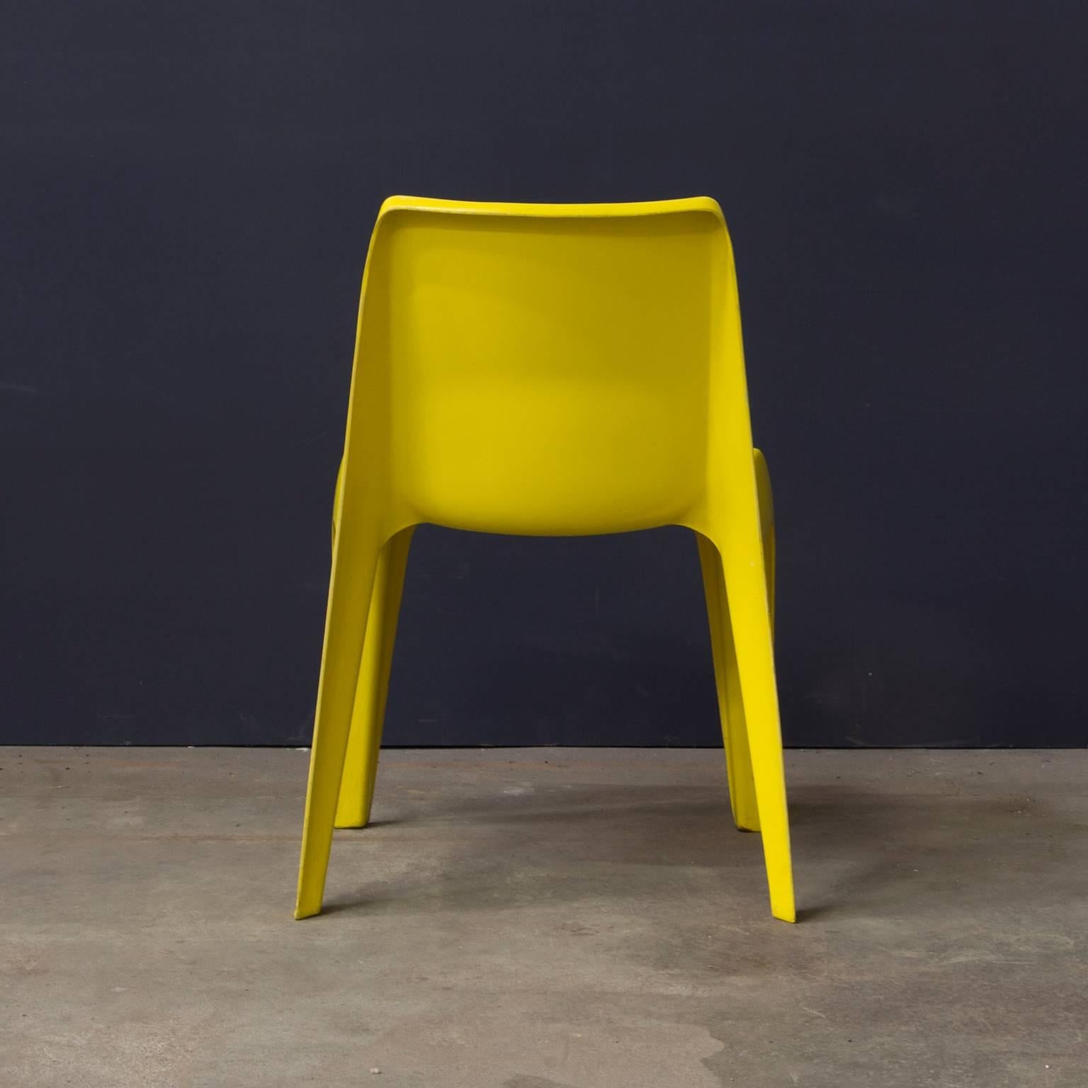 yellow plastic chair
