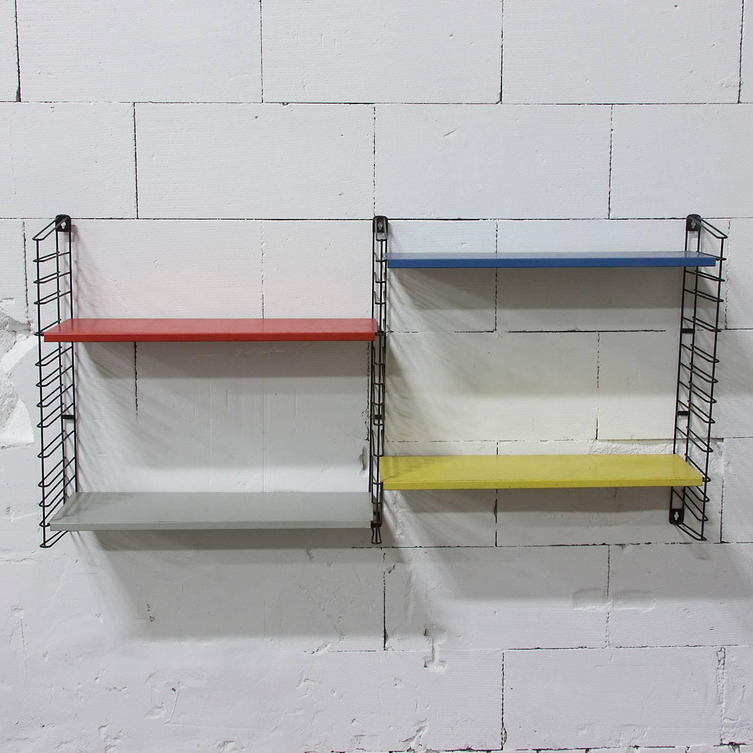 Please ask Casey Godrie Ibiza/Amsterdam for our competitive shipping quotes.

Very colorful modular wall unit. Adjustable into many varieties. Some rusty spots and loss of paint.
Weight of this set total 10 kg.
A shelf 19 cm W x 1,5 cm x 64,5 L