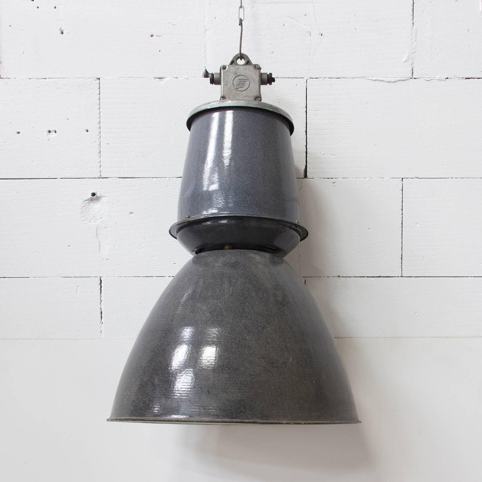 Please ask Casey Godrie Ibiza/Amsterdam for our competitive shipping quotes. 

This very nice large Industrial lamp was used in a factory and we didn't change anything to make it burning so you can change it to use for 110 volt or 220 volt.

Good