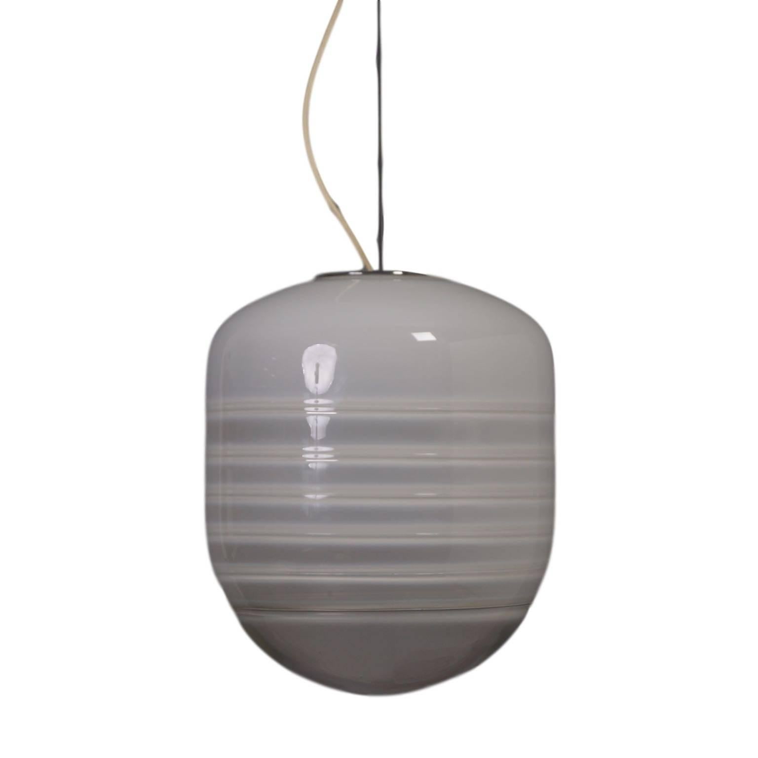 Large Italian Murano pendant by Alfredo Barbini, 1960s; designed by Alfredo Barbini and made in Italy at Vetreria Alfredo Barbini. This lamp is made of mouth blown Murano glass and hangs on a frame of chromed metal. The handblown Murano glass is
