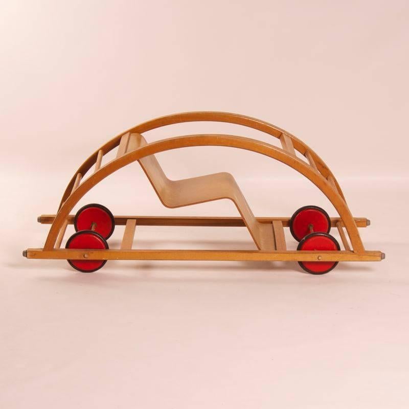 Reversible kids car and rocking chair designed by Hans Brockhage and Erwin Andrä under the supervision of Mart Stam and made at the company Siegfried Lenz BerggieszhüBel in circa 1950. Hans Brockhage studied from 1947 to 1952 at the College of