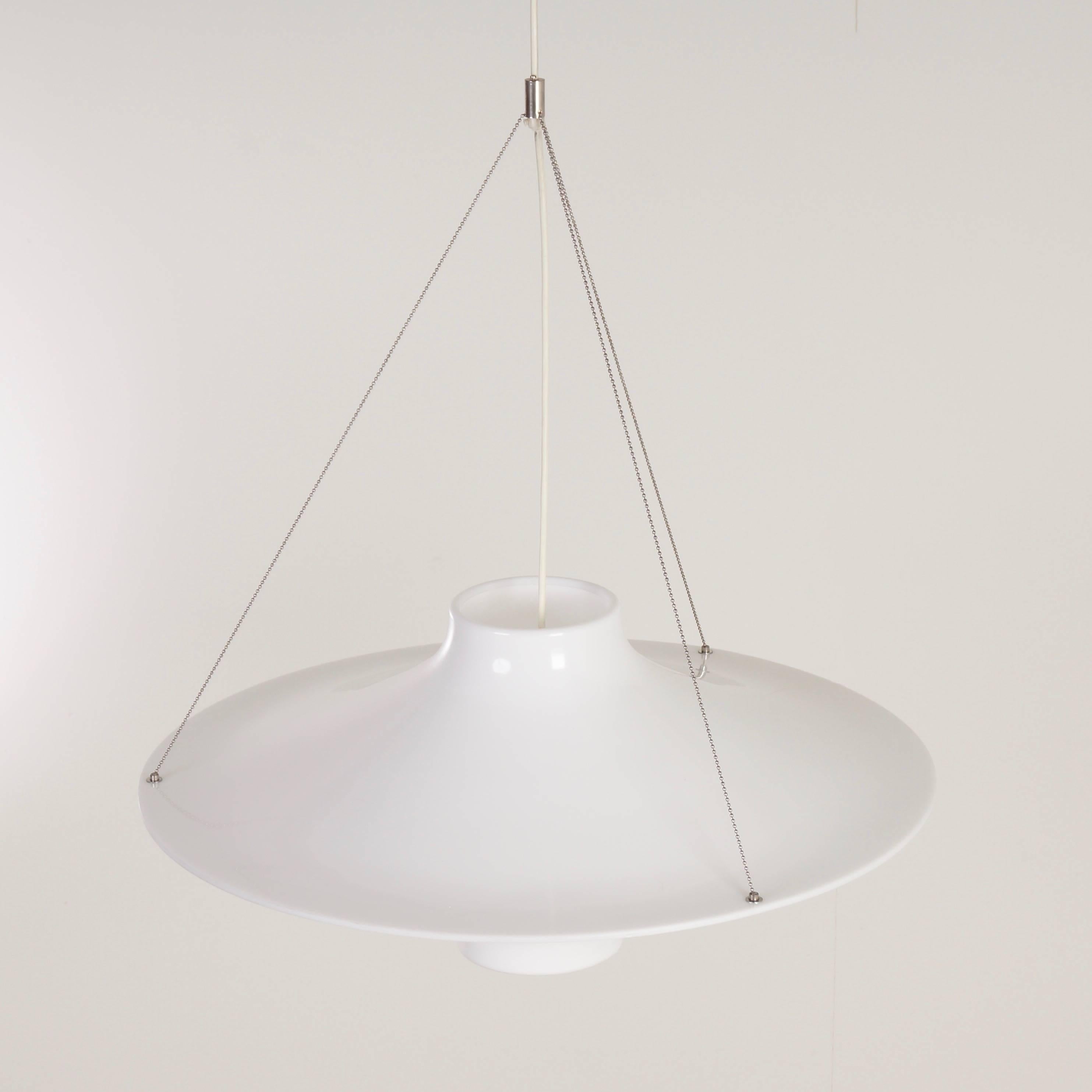 Skyflyer pendant designed by Yki Nummi (Finland) for Stockmann-Orno in 1960. Yki Nummi designed a series of plexiglass lamps in the 1950s and 1960s. This is Yki Nummi’s best known design and the lamp has also won many international awards. The shade