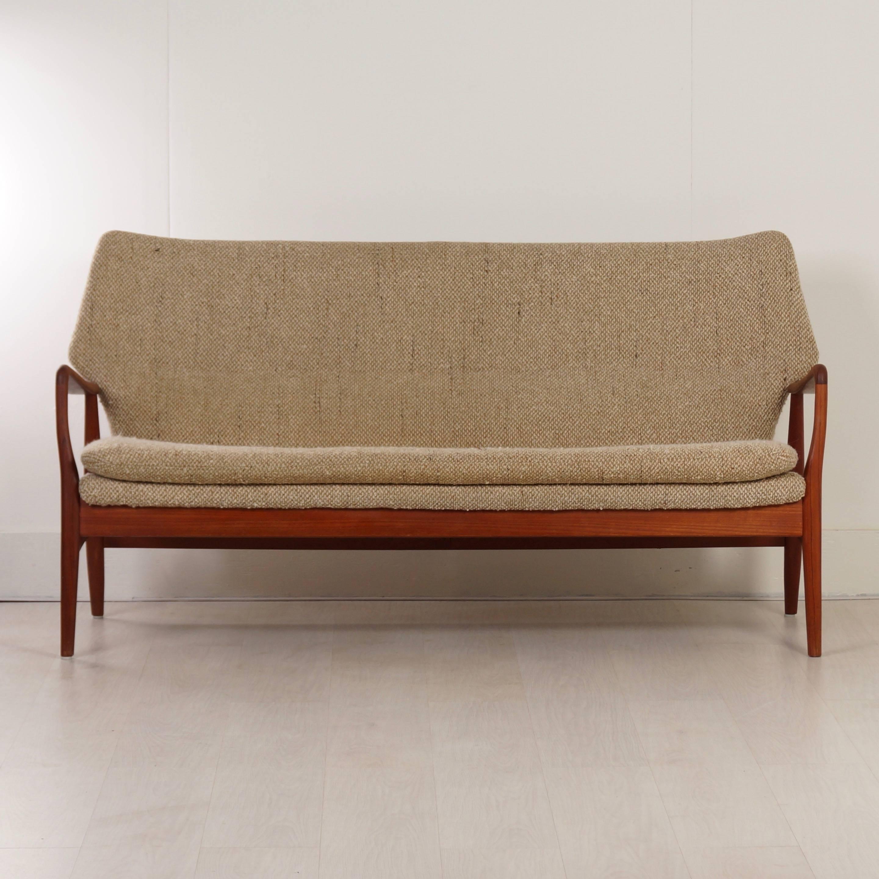 Rare living room set designed by Aksel Bender Madsen for the Dutch furniture company Bovenkamp, 1960s. Three-seat sofa, armchair gentlemen and ladies armchair. It is a model with very fine and beautifully made teak armrests (see photos). The