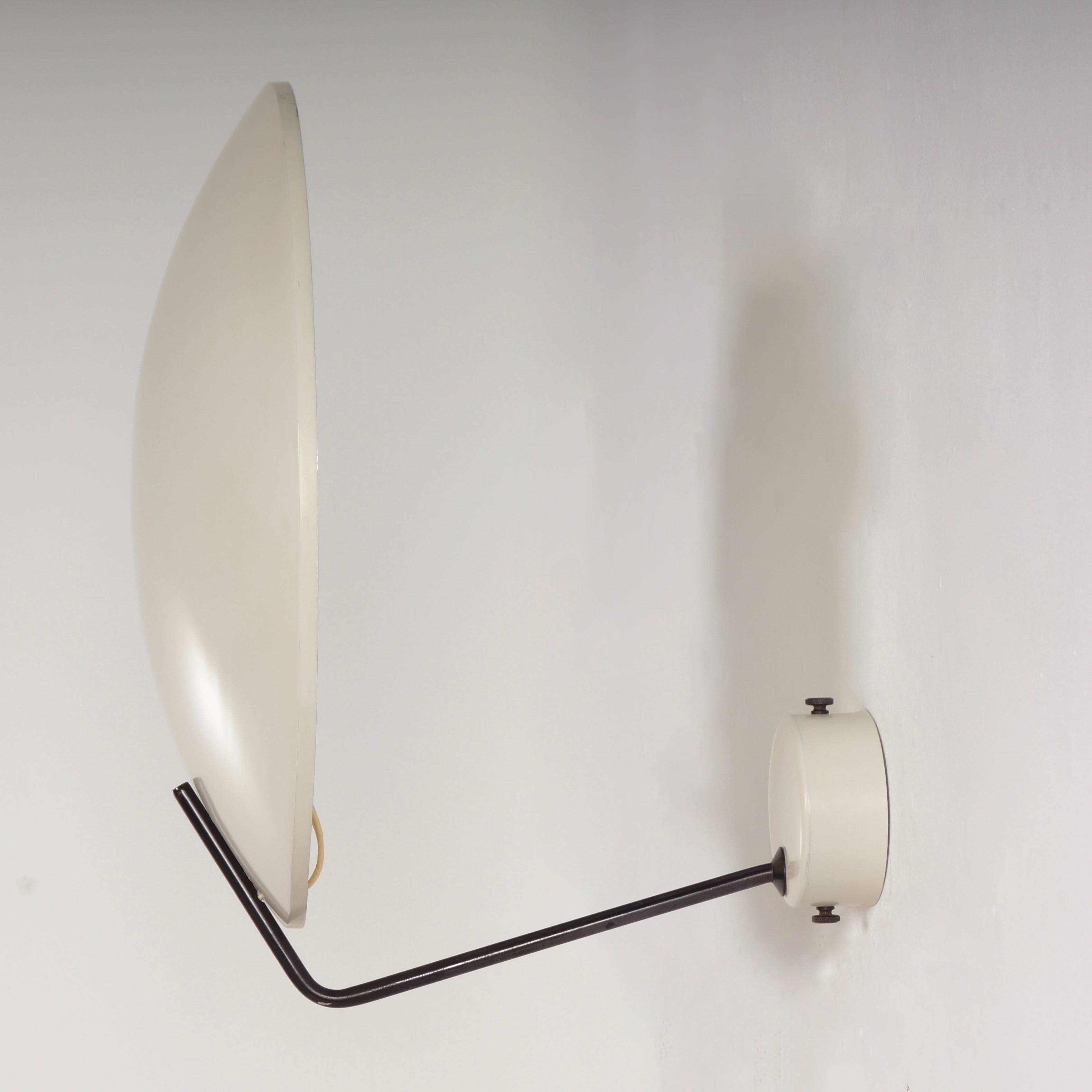 Rare Italian wall or ceiling model 232 designed by Bruno Gatta for Stilnovo in circa 1962. The design was very progressive for its time. This wall lamp is +/- 60 years old, but still fits perfectly in timeles interiors. Considering its age this lamp