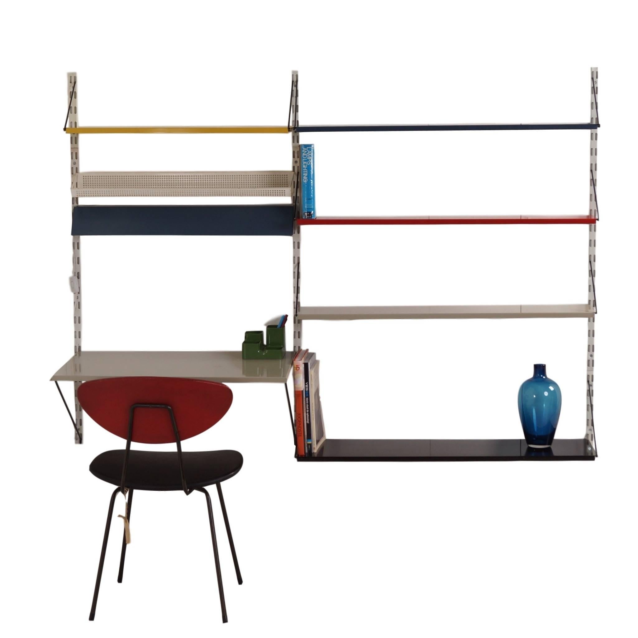 Pilastro wall system by Tjerk Reijenga. This wall unit is designed by Tjerk Reijenga in the 1960s with a desk, a blue light box above the desk and a perforated rack.

Material: Iron with powder coating in the colors yellow, blue, black, red, gray