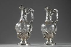 Pair of Cut Crystal Ewers Set in Silver