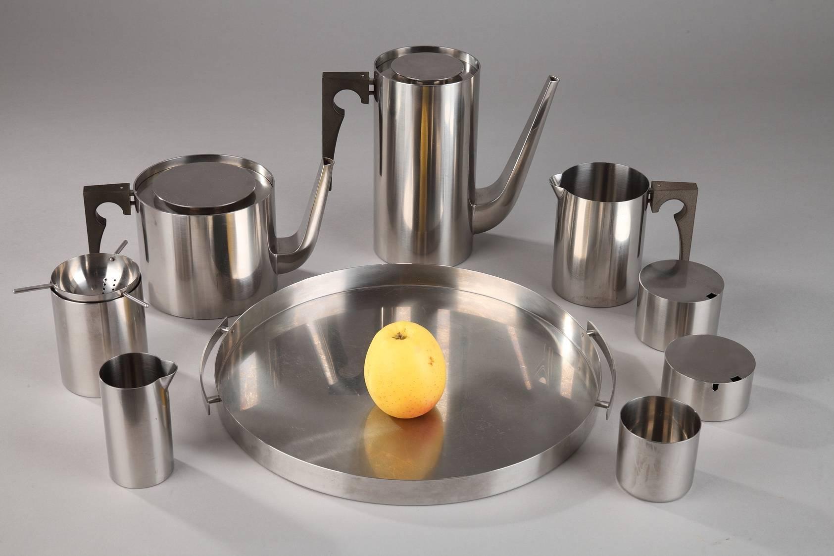 Arne Jacobsen (1902-1971) coffee and tea service, manufactured by Stelton. Launched in 1967, the Cylinda Line designed by Arne Jacobsen immediately attracted considerable attention for its serene and functionalist design. All items are made of