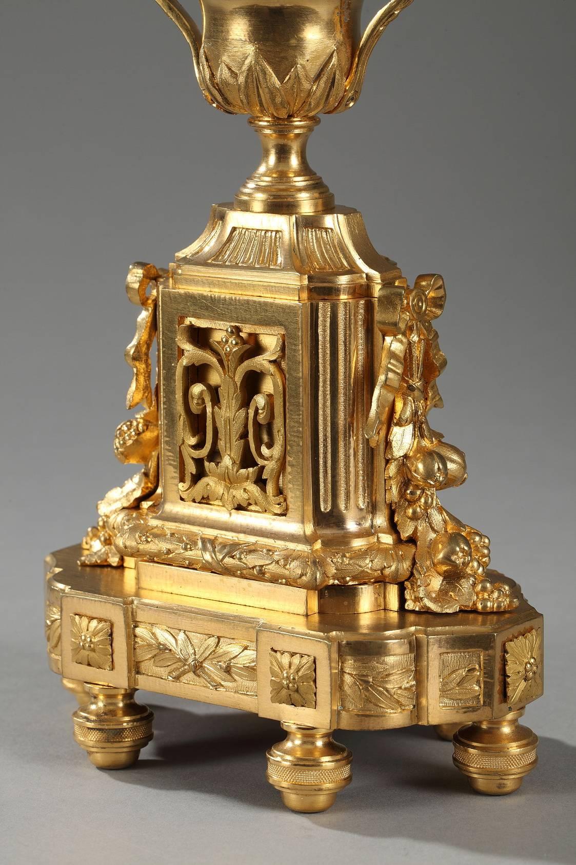 Bronze Clock and Pair of Candelabras in Louis XVI Style