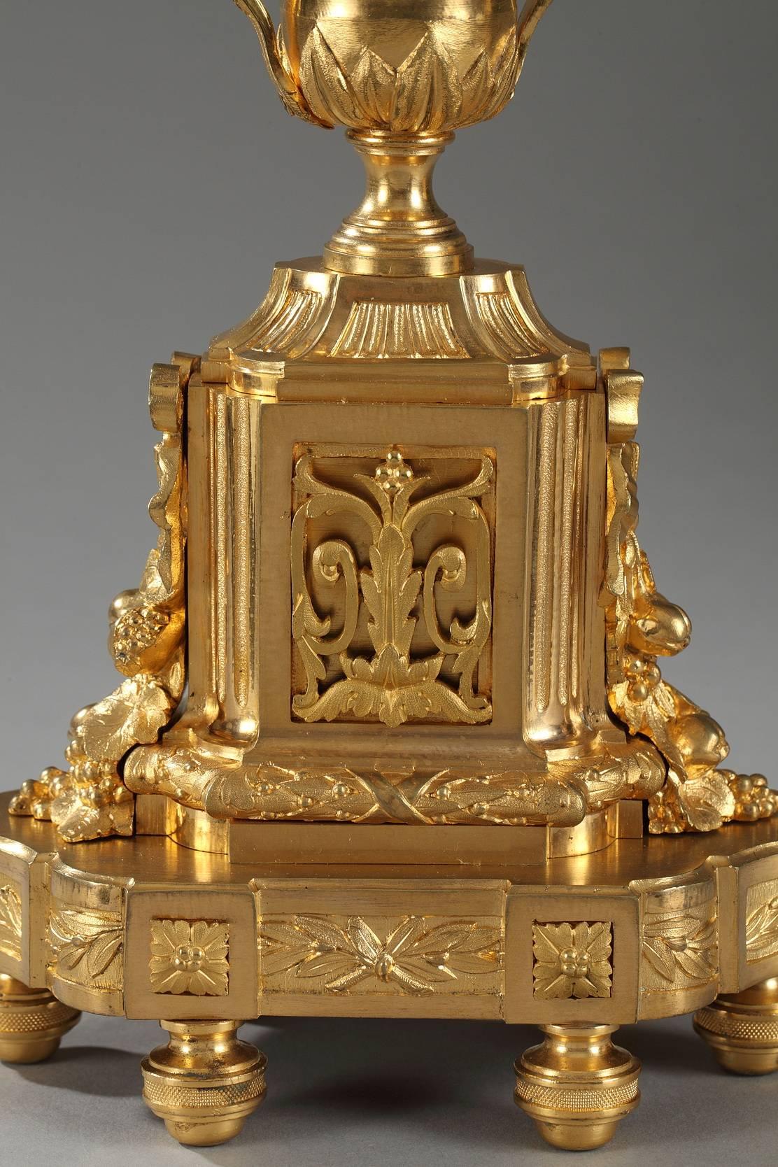 Clock and Pair of Candelabras in Louis XVI Style 1