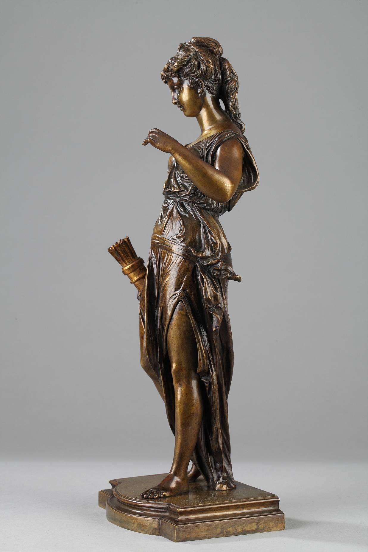 Patinated bronze sculpture representing Diana the huntress wearing a stole and carrying a quiver. The sculpture is set on a rectangular base with a curved central offset. Signed: J. Guillot. 19th century. Beautiful sculpting and foundry work with
