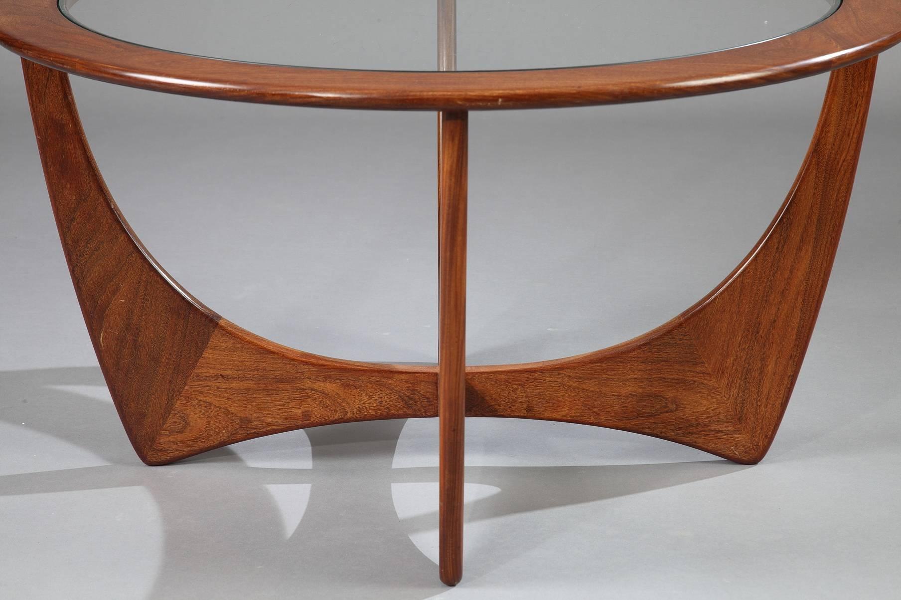 Round teak coffee table with glass top, also called 