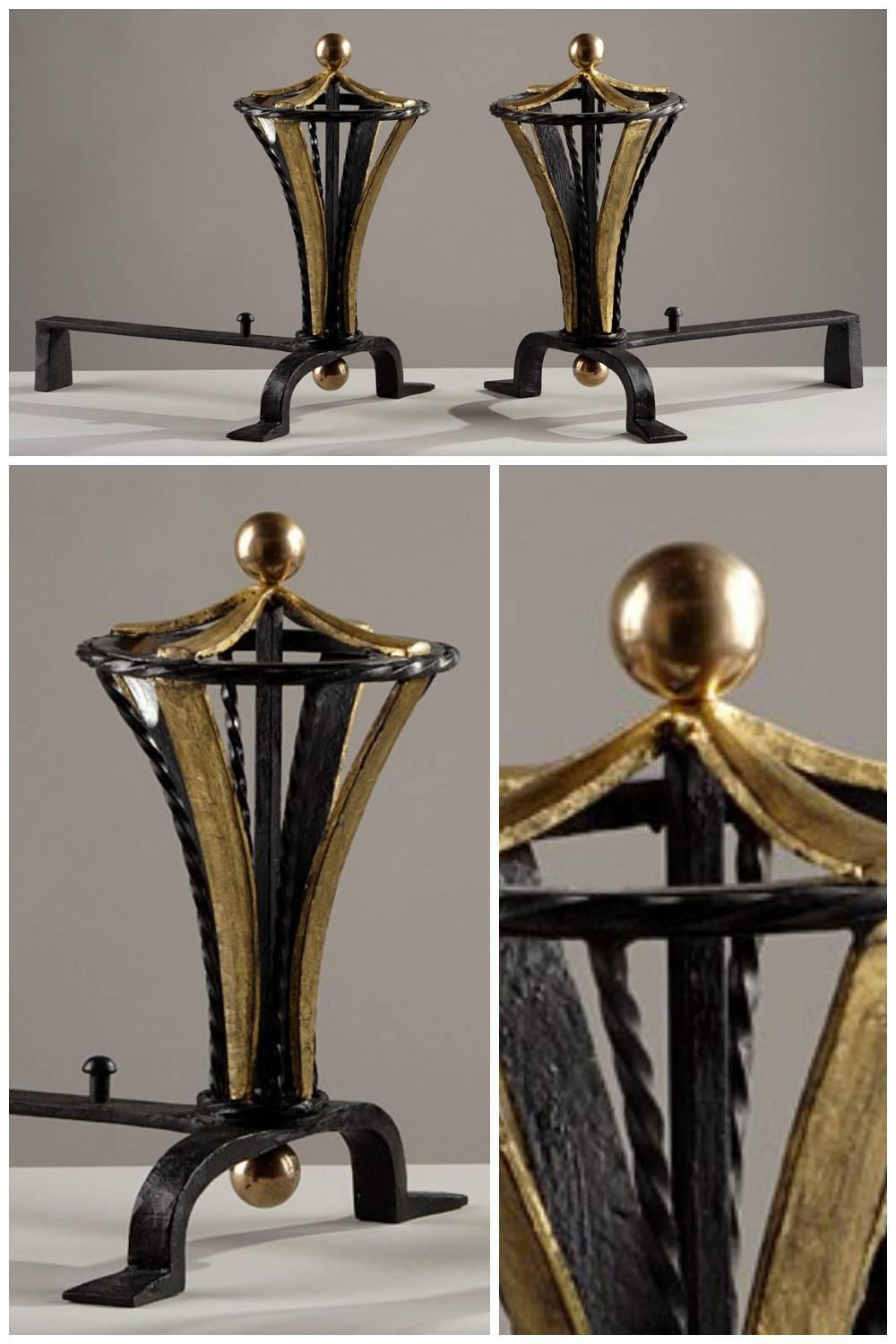 A pair of patinated and gilded iron wrought Art Deco chenets,

circa 1940.
Dimensions: W 13.4 in, D 12.2in, H 14.6 in.
Dimensions: L 34cm, P 31cm, H 37cm.
         