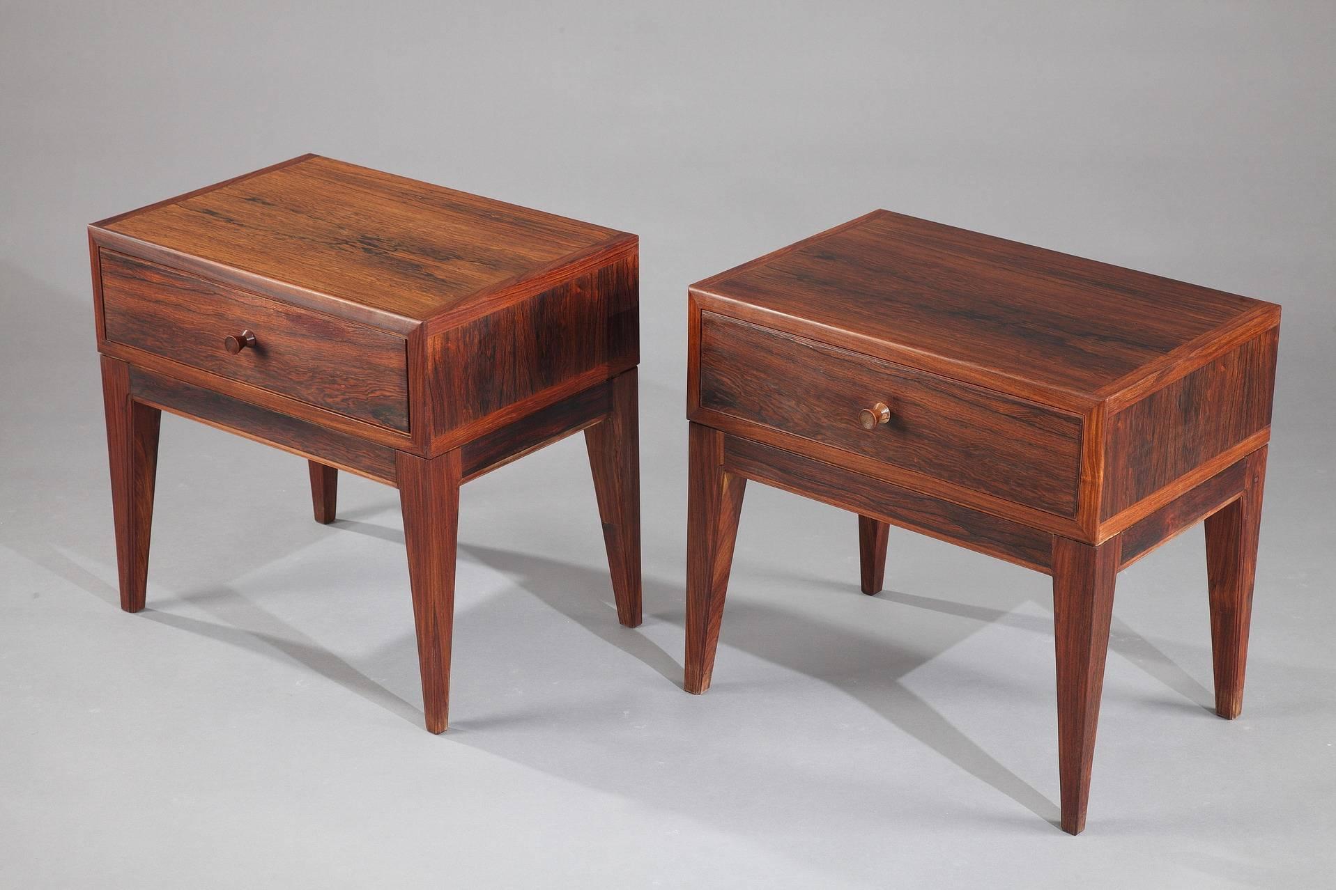 Pair of Brazilian rosewood side tables designed by Henry Rosengren Hansen in the 1960s. Each table provided with a drawer and a wooden plug. Made in Denmark. Very good vintage condition.


circa 1960
Dimensions: W 19.9 in, D 14.6 in, H 18.5