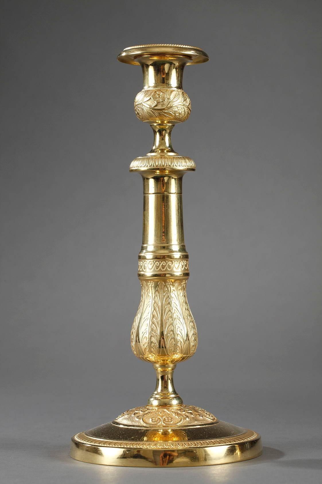 Gilt Pair of Ormolu Candlesticks with Palmettes and Flowers