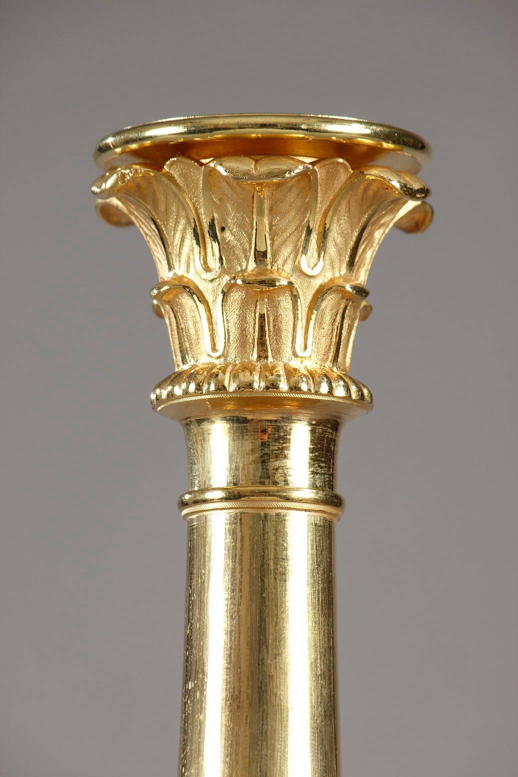 Gilt Pair of Empire Candlesticks with Allegories of Victory