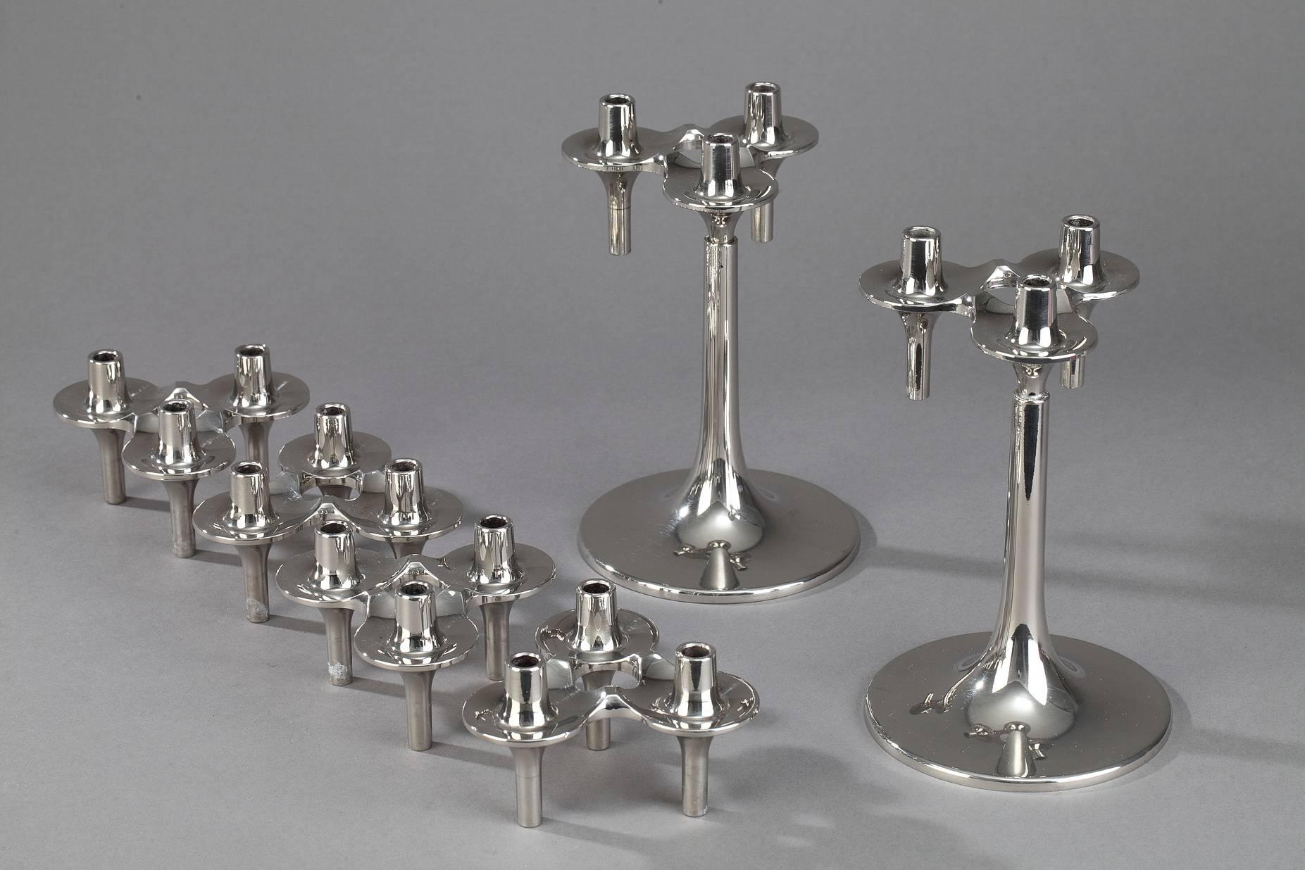 1970s pair of Orion chrome-plated metal candelabra, each of them composed of 3 modular candlesticks and 1 stem with circular base. Produced by Bayerische Metallwarenfabrik (BMF) in Germany. As Nagel candle holders, BMF candlesticks can be used