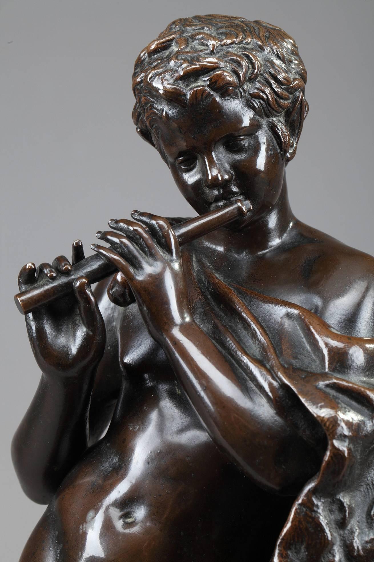 19th century patinated bronze figure featuring the satyr Marsyas playing the flute. He is standing against a column, partially covered with his own skin, which refers to Apollo's punishment. Marked with two numbers underneath: 18124 and 170. French