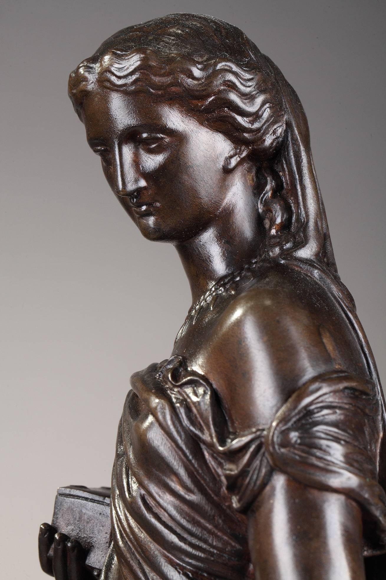 19th century patinated bronze statue by Eugène-Antoine Aizelin (French, 1821-1902). It features Pandora in a standing pose wearing a flowing robe, holding a box close to her chest. Signed on the base: Ene AIZELIN Fit. Ferdinand BARBEDIENNE mark.