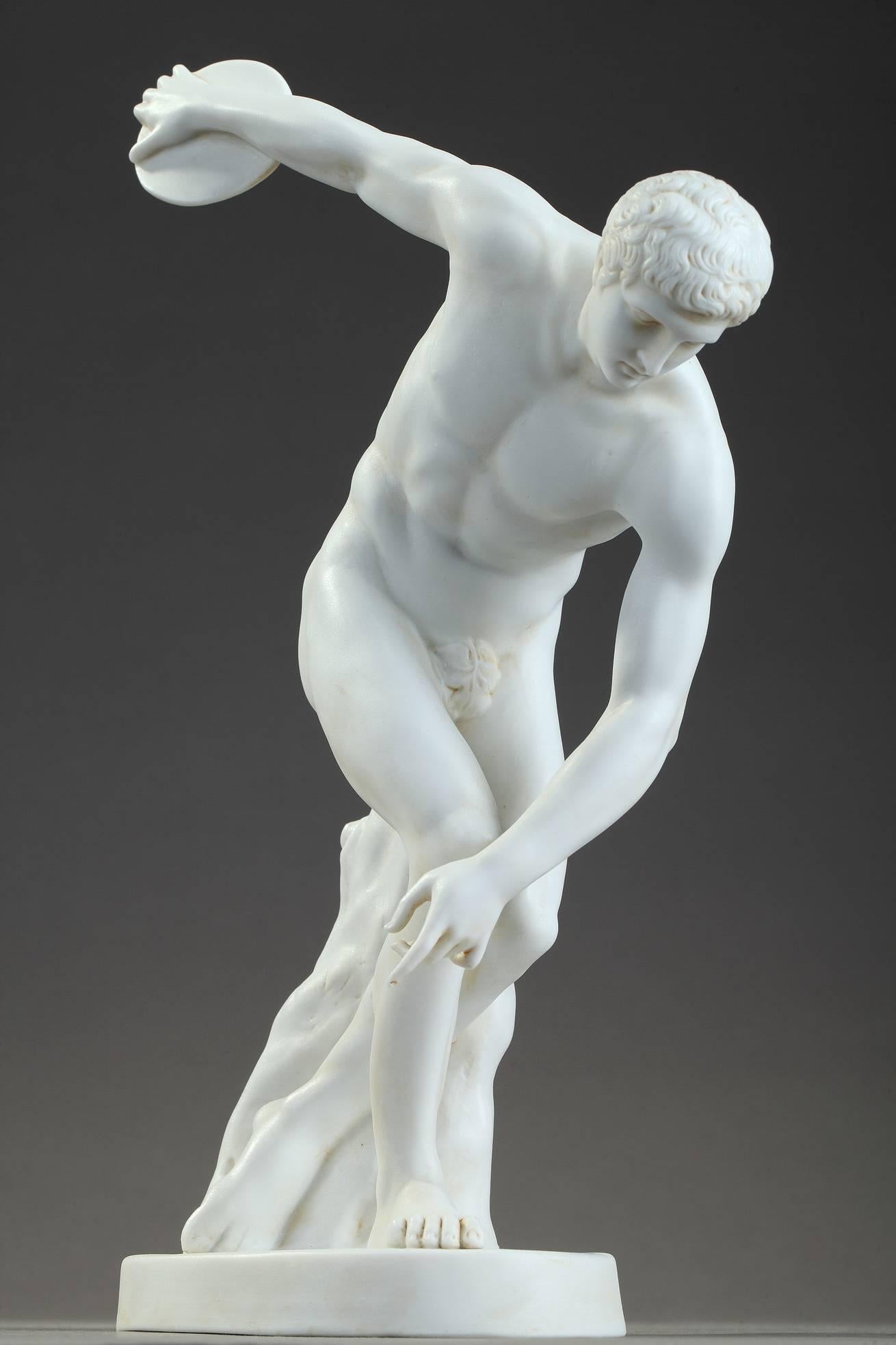 Late 19th century porcelain bisque figure featuring the Discobolus of Myron, after the Antique. The Discobolus is a Greek sculpture that was completed toward the end of the Severe period, circa 460-450 BC. The original Greek bronze is lost but the