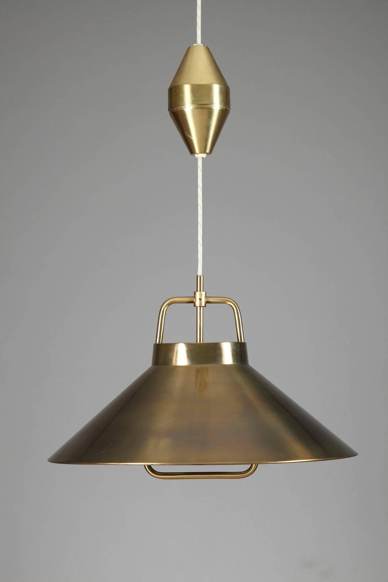A brass pendant with adjustable height mechanism and brass canopy by Frits Schlegel. Model P 295. Manufactured by Lyfa. 

circa 1960
Dimension: L 44cm, P 44cm, H 35cm.
