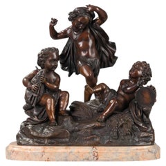 Gruppo scultoreo in bronzo della fine del XIX secolo, con amorini che suonano