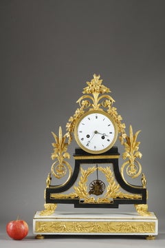 Grande orologio del periodo Directoire in bronzo patinato e dorato