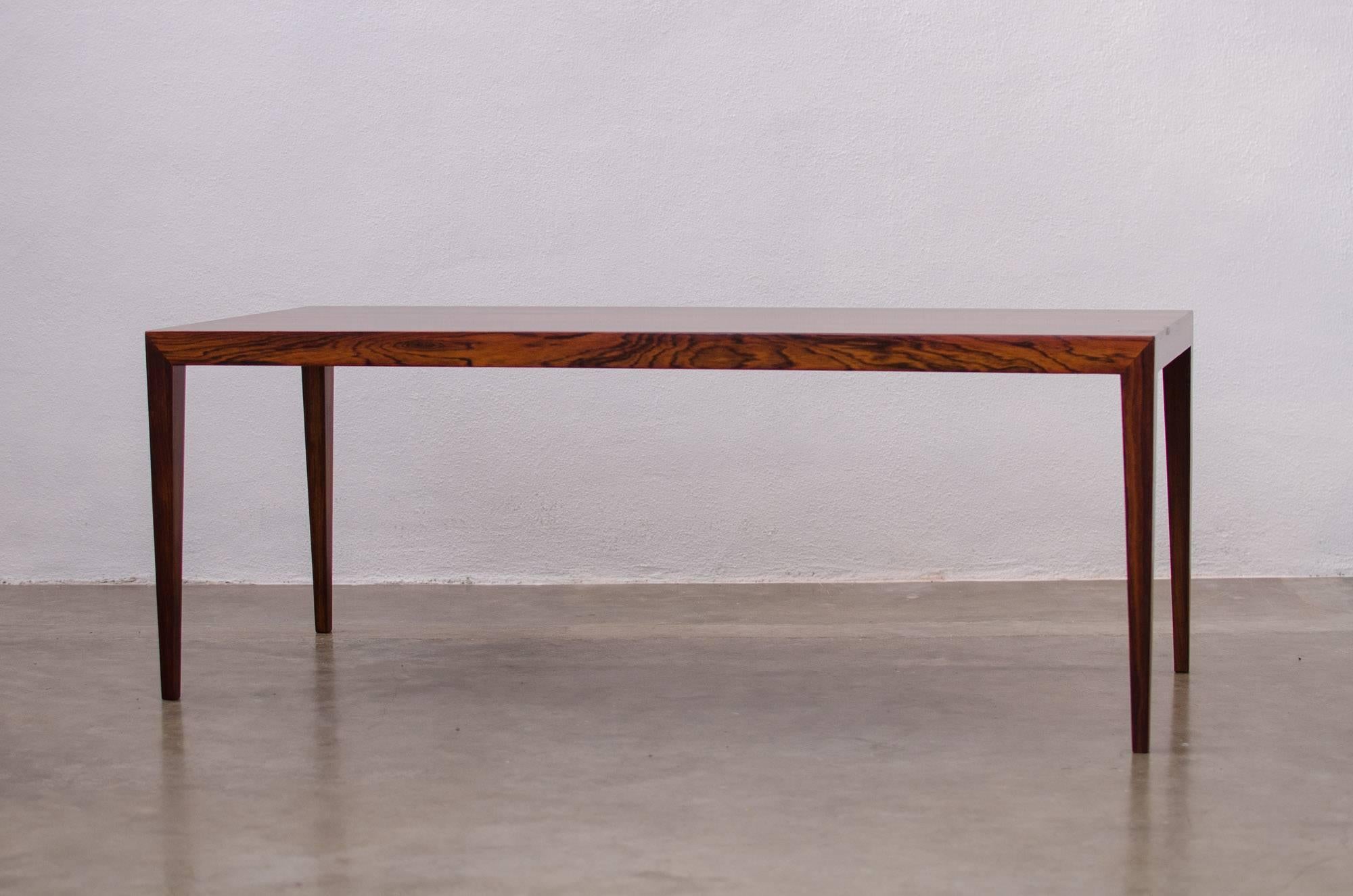 A solid rosewood coffee table designed by Severin Hansen Jr. for Haslev. This table has a stunning, rich grain and is in mint condition.

Marked underneath.