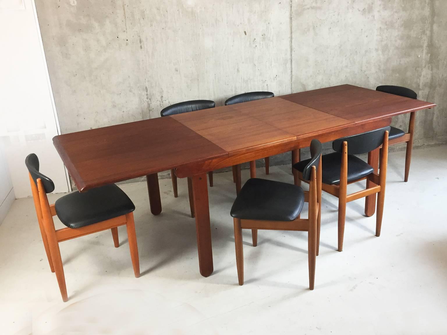 Mid-Century Modern 1970s Mid-Century Teak Extendable Dining Table and Six Black Vinyl Chairs