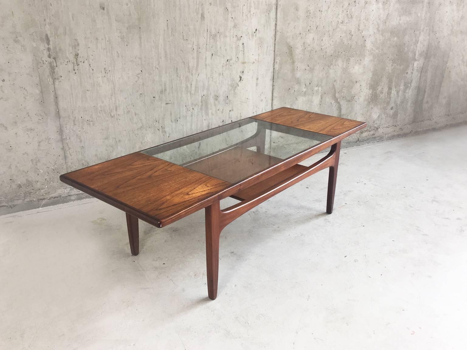 An elegant and stylish coffee table made by G Plan in the 1970s. A sleek sculpted shape with attractive wood grain throughout. In excellent condition.


 