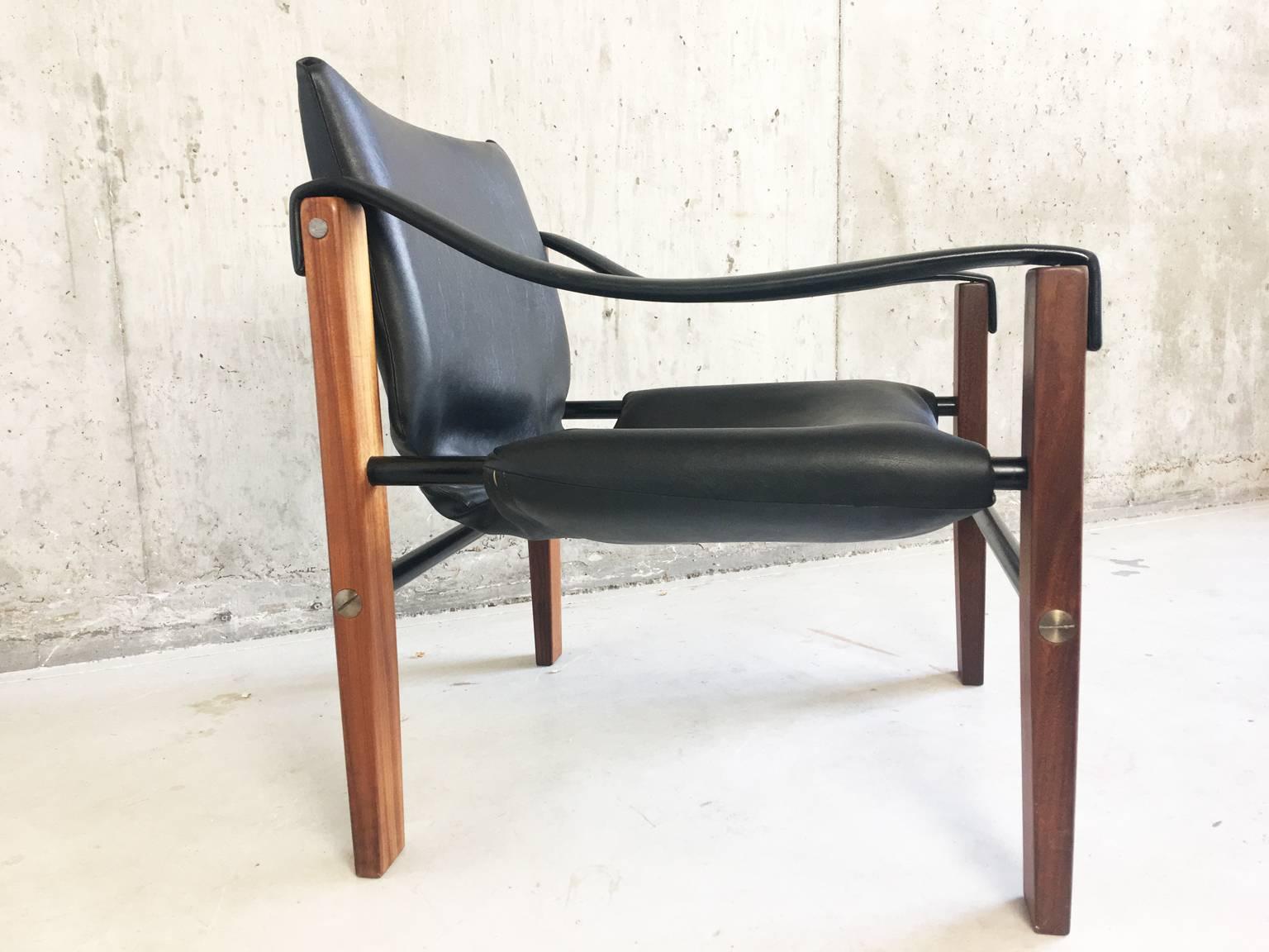 An original safari chair designed by Maurice Burke for Arkana. An elegant yet functional style, this chair is a standout piece of Mid-Century design.

Designer: Maurice Burke
Manufacturer: Arkana
Country of origin: UK
Material: Leatherette,