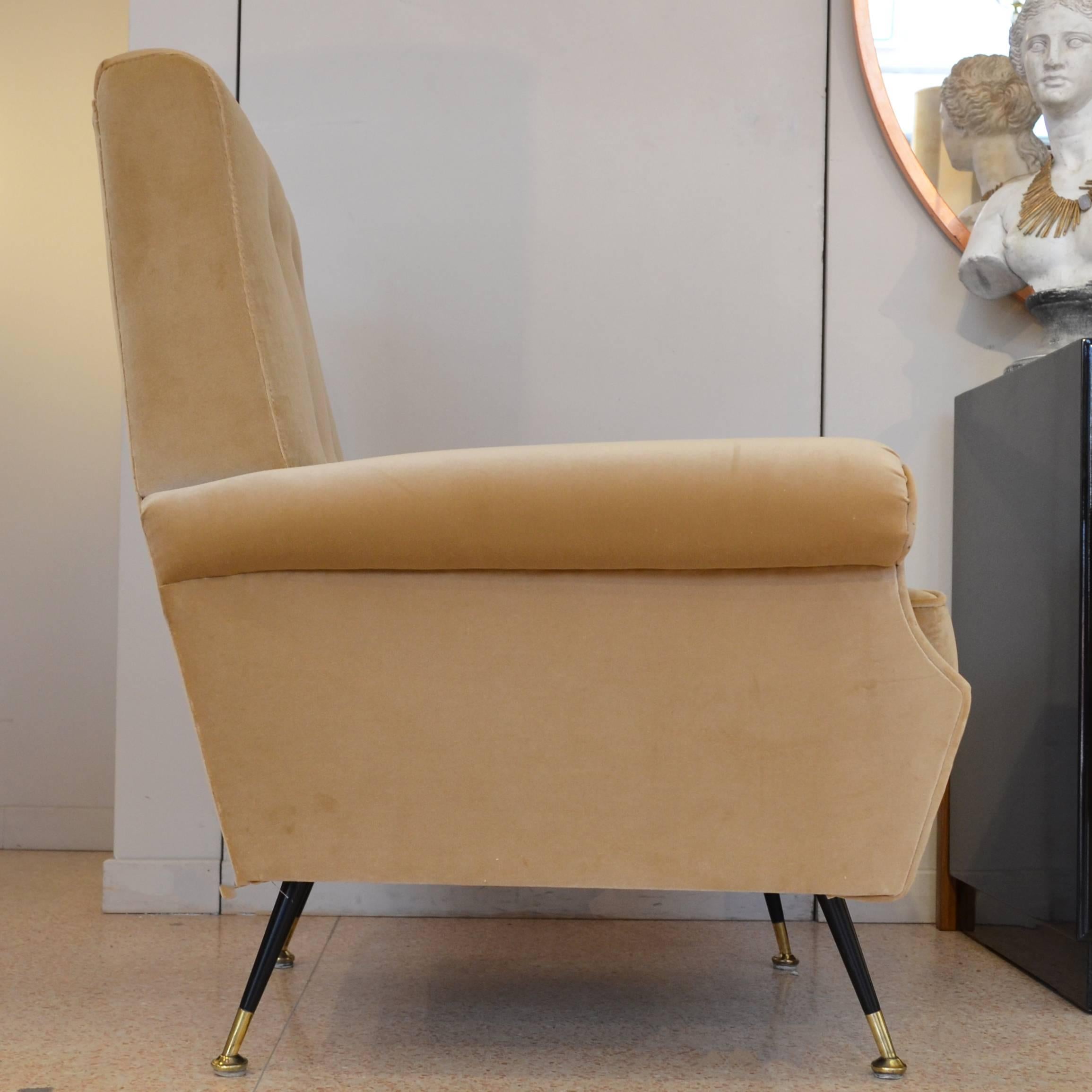 Italian armchairs from 1950s with typical shape of vintage armchairs. Legs made of iron, end with brass details to give the idea of lightness as per Gio Ponti theory so important for this period in Italy.
Velvet upholstery is beige colour and is