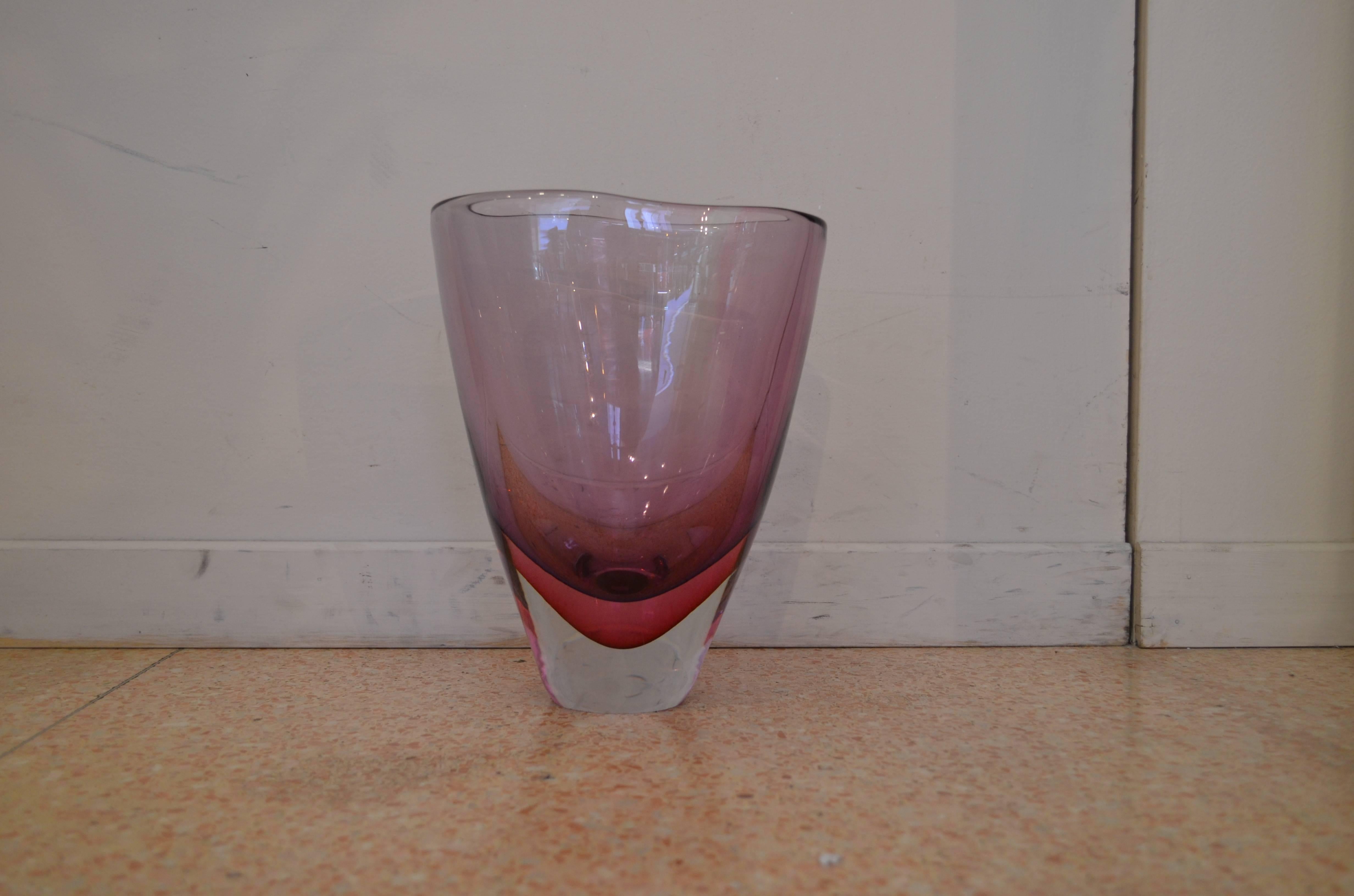 Vase made according by the Typical Murano glass technique called Sommerso which literally means submerged. It shows two layers of glass in two different colors where one is submerged by the other one.
Designed by Poli for Seguso. 
Perfect as