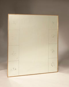 Decorative mirror with silk-screened designs and a brass frame from the 1940s