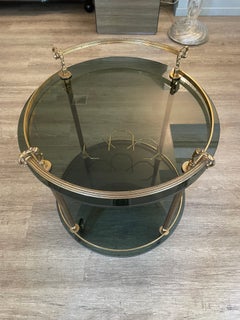 Round brass and smoked glass trolley from the 1970s
